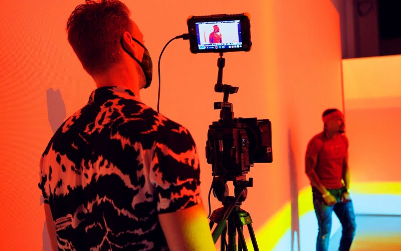 Camera man wearing Covid-19 mask